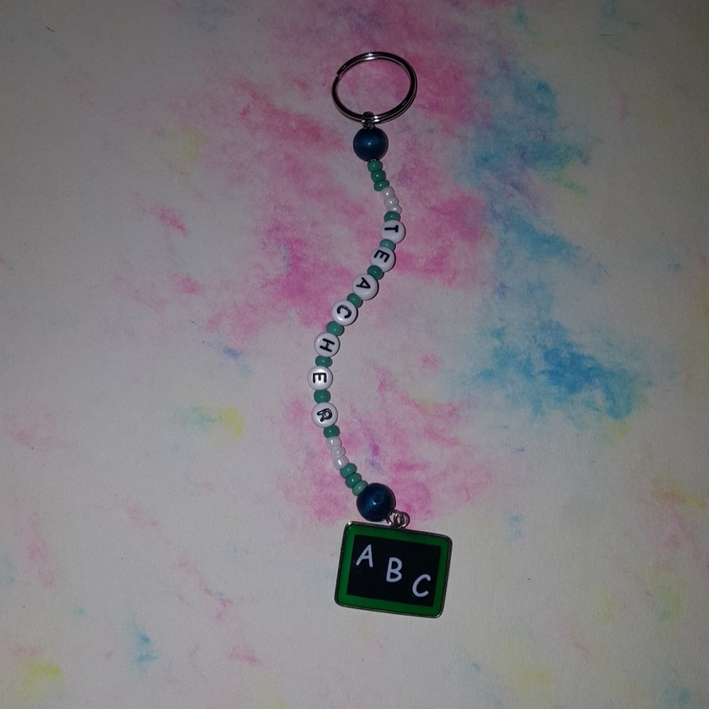 Handmade Teacher bead keychain with charm.